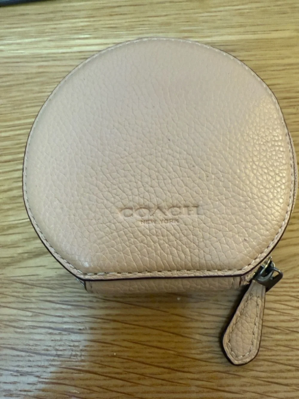 Coach Peach Pebbled Leather Round Coin Case with White Graphic